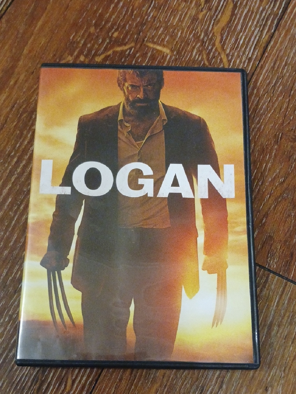 LOGAN DVD — Orange/Black Cover